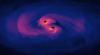 Simulated electromagnetic (EM) emission from accreting binary massive black hole during the late inspiral phase. [NASA/GSFC]; Credits: https://svs.gsfc.nasa.gov/13086/