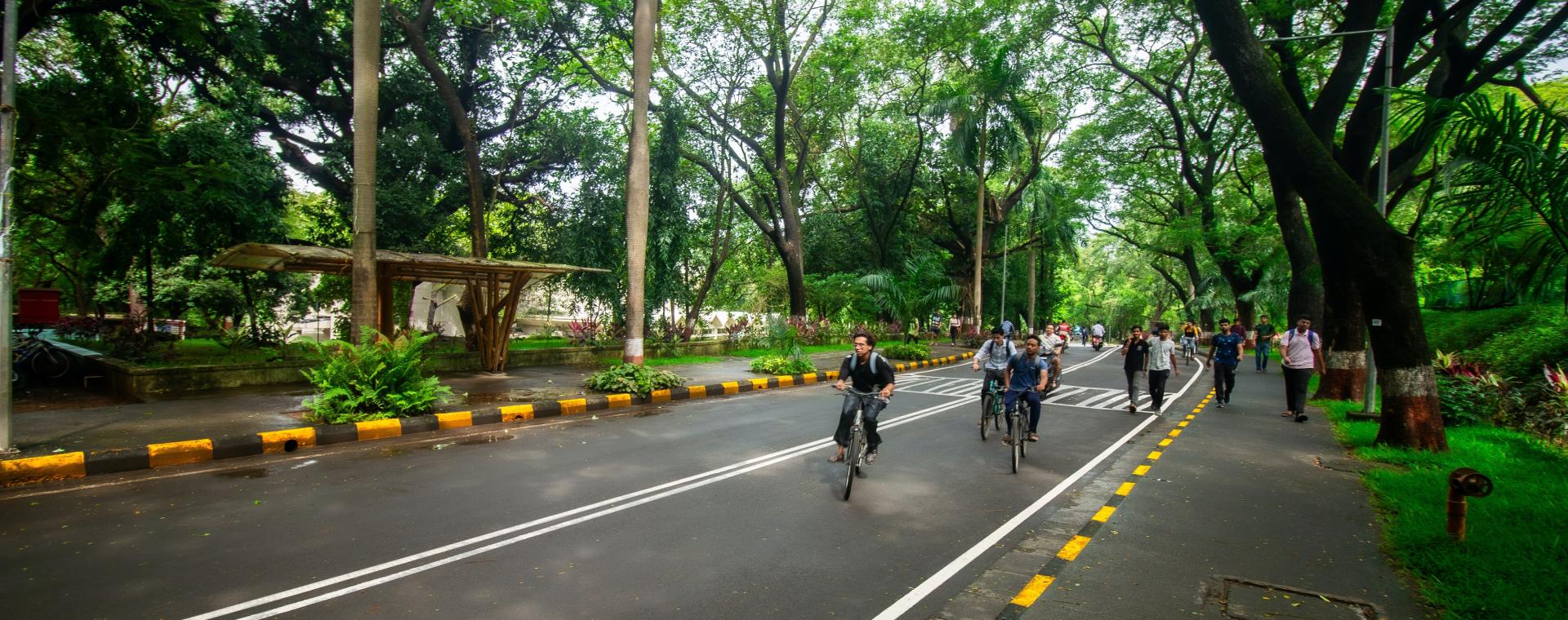 Student cycling to the class room