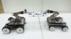 Two different types of robots/ manipulators cooperating to perform a task